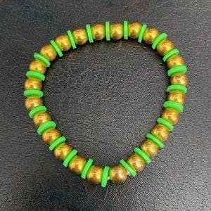 Green and gold beaded bracelet